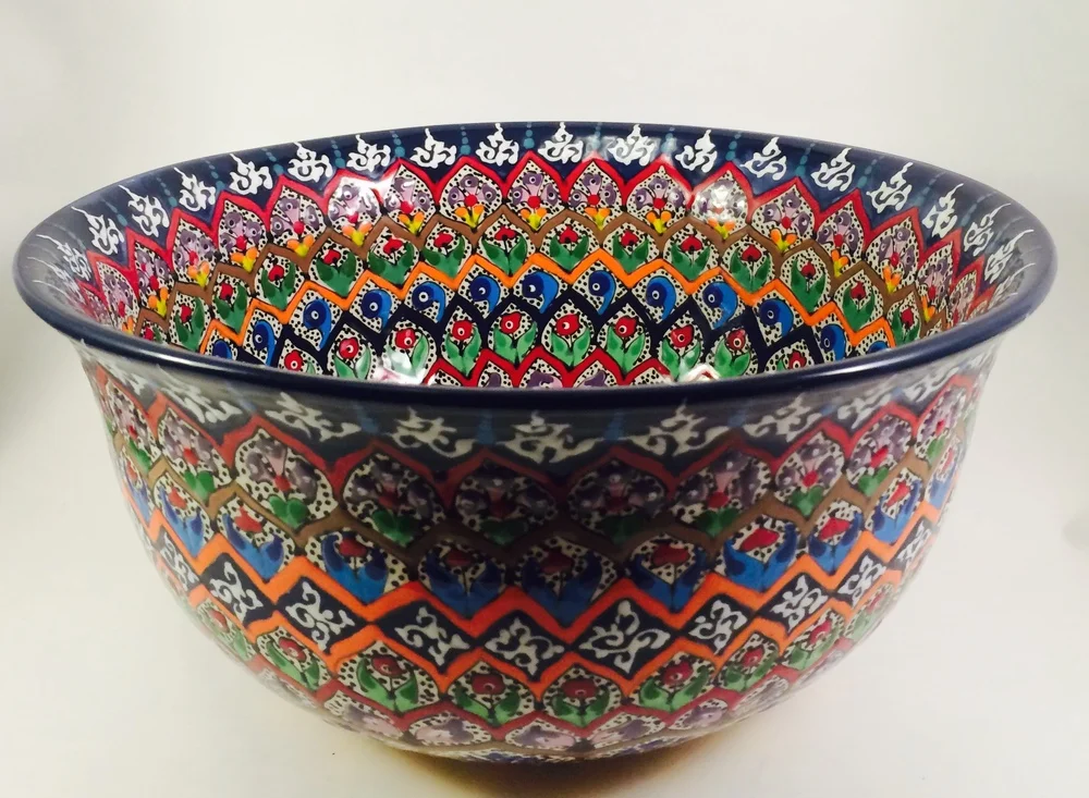 Rezgar Mamandi Booth #128 mannapottery.com