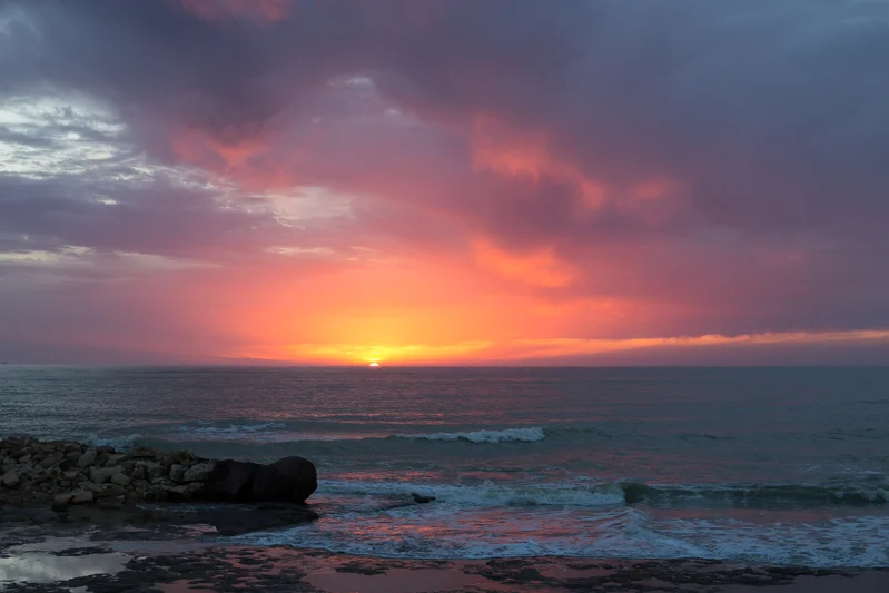 Sunsets (and sunrises) can benefit from deliberate under-exposure