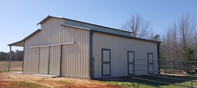 The raised height of their barn allows for larger horse trailers and equipment to be stored and creates a more ventilated area for your horses.