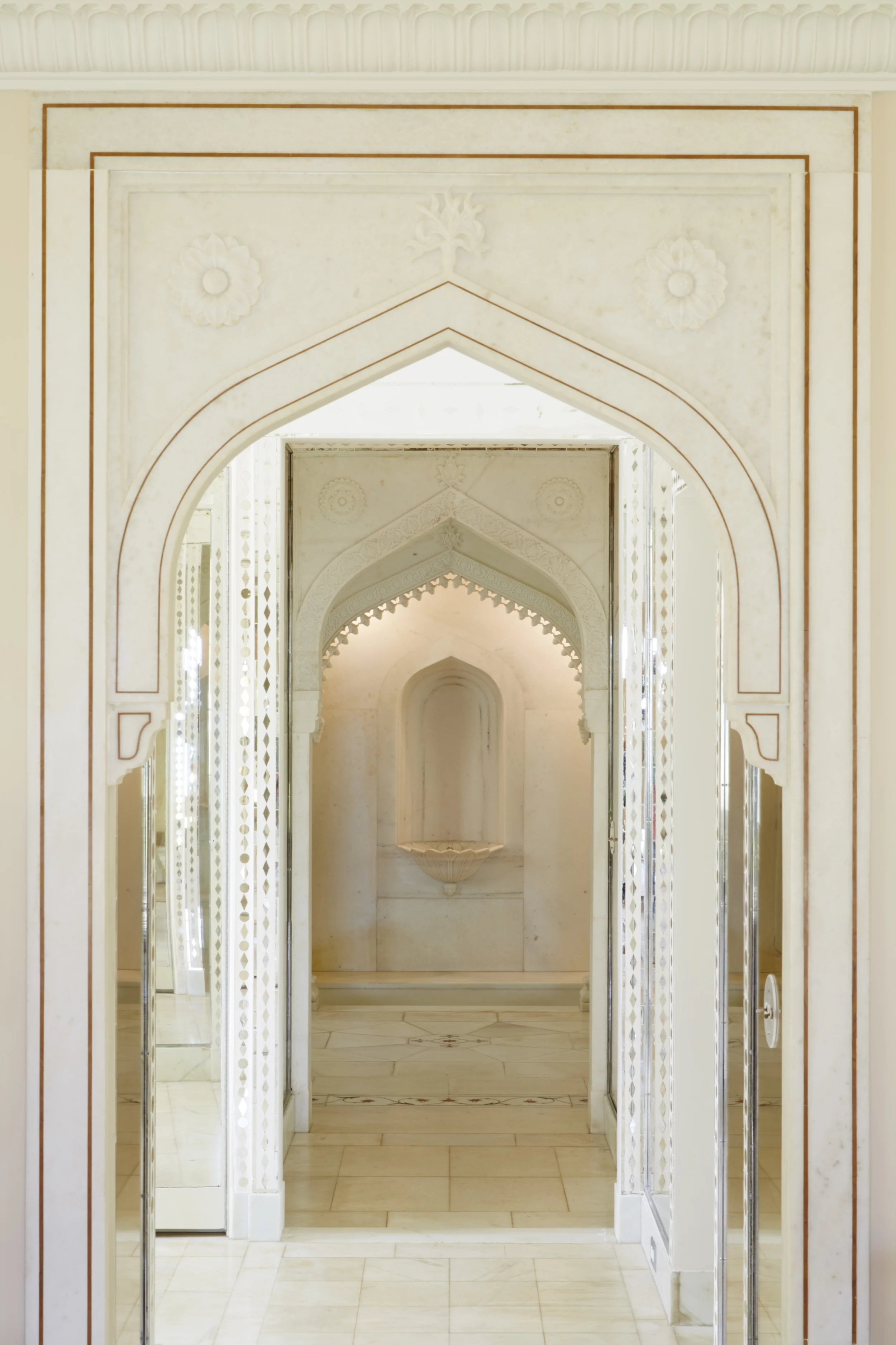Bathroom of the Mughal Suite featuring marble wall panels and floor with inlaid stone. © 2014, Linny Morris, courtesy of the Doris Duke Foundation for Islamic Art, Honolulu, Hawai'i.