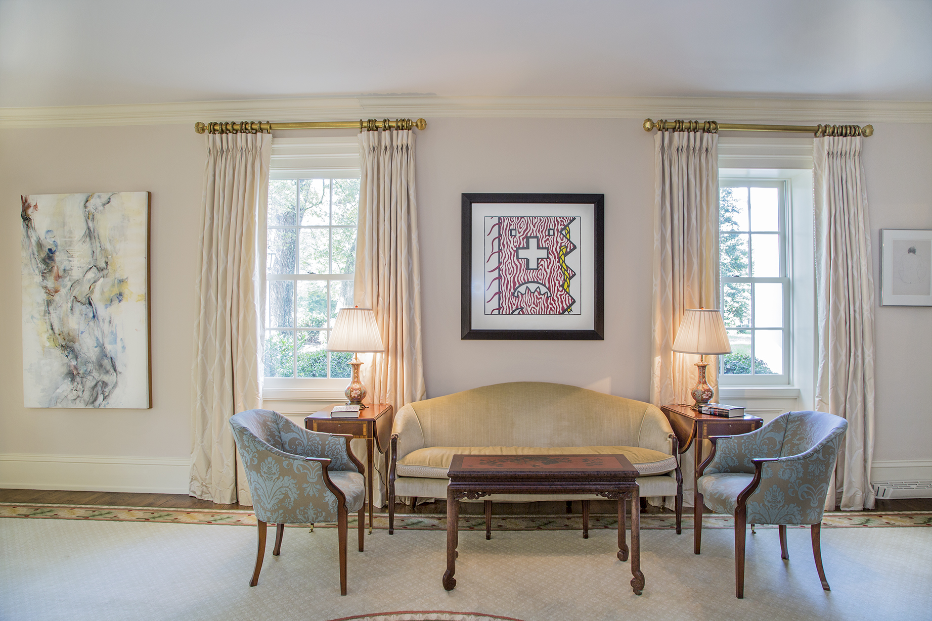 A painting (left) by Douglas Houchens, the founder of Davidson College's art department, hangs next to an original Roy Lichtenstein.