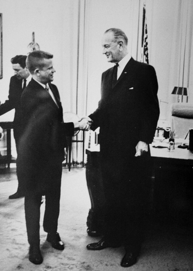 Robert Morgan serving as North Carolina's Attorney General shaking hands with President Lyndon B. Johnson