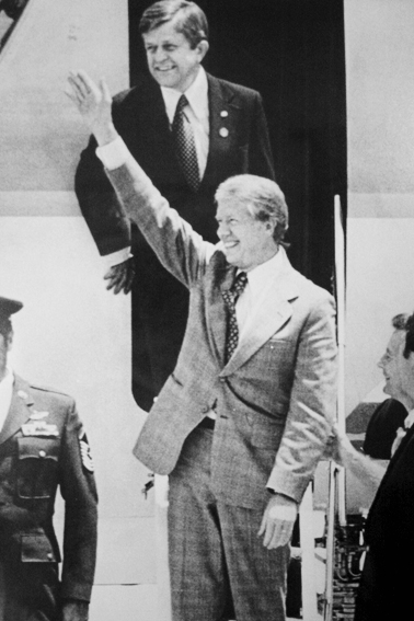 Jimmy Carter exiting Air Force One with Robert Morgan