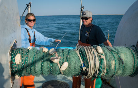 Dunn with fishing mate Occasionally a mate accompanies Dunn when she heads to offshore fishing areas. Photo by Daniel Pullen.