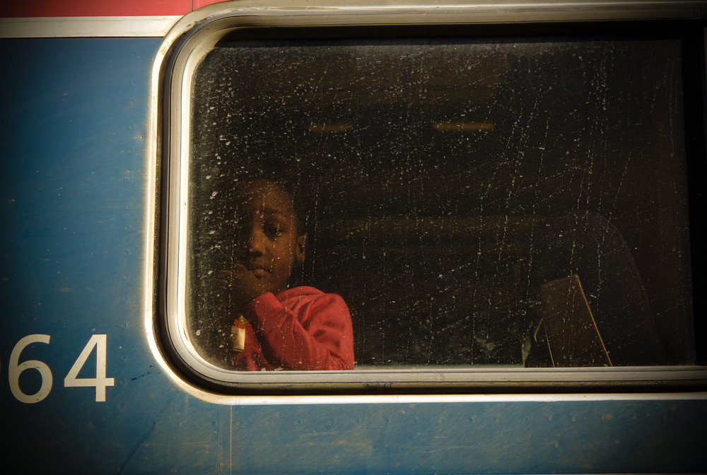  Girl looking out Southbound train window, Rocky Mount. 