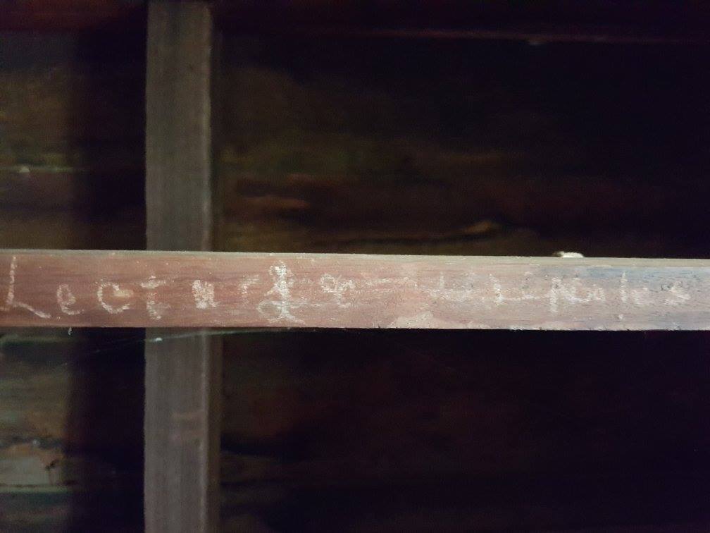 Labelled shelf in Katharine Susannah Prichard's writing shack.