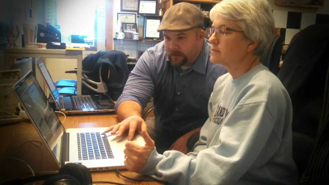 Johnny B Allen providing one-on-one training to Lynn Benson at DW Video & Multimedia, in Howard City, MI