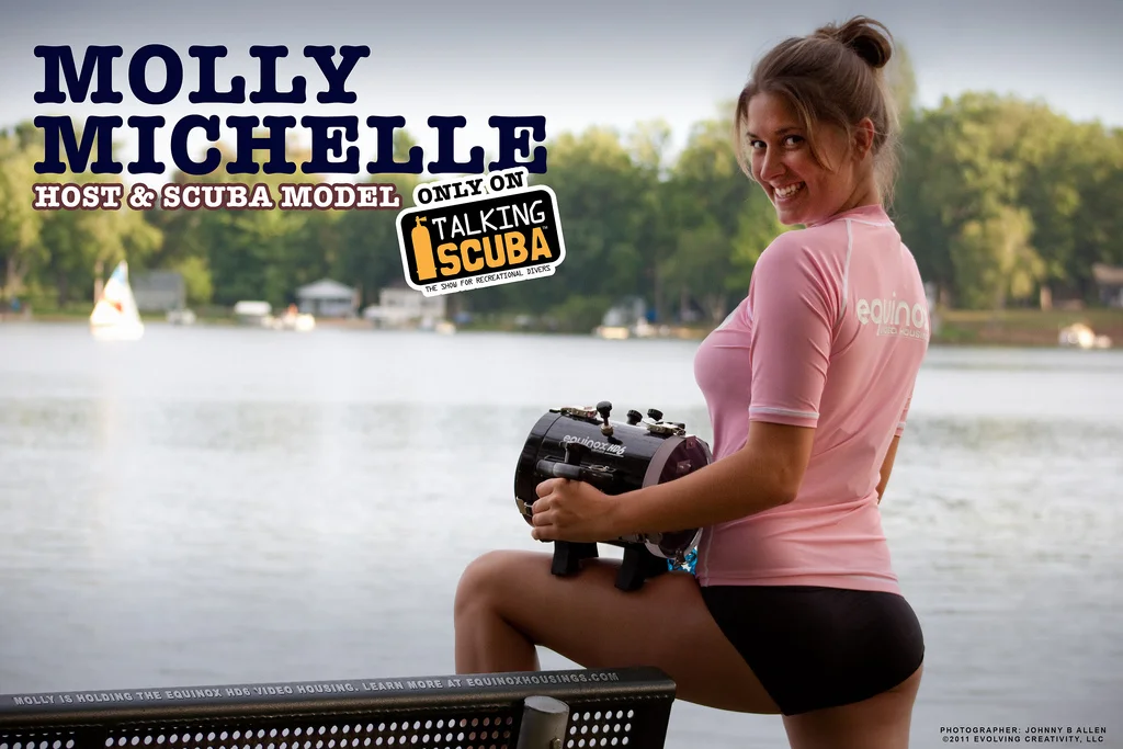 Molly is holding the Equinox Video Underwater Housing, made in Michigan. Photographer/Photoshop artist Johnny B Allen.