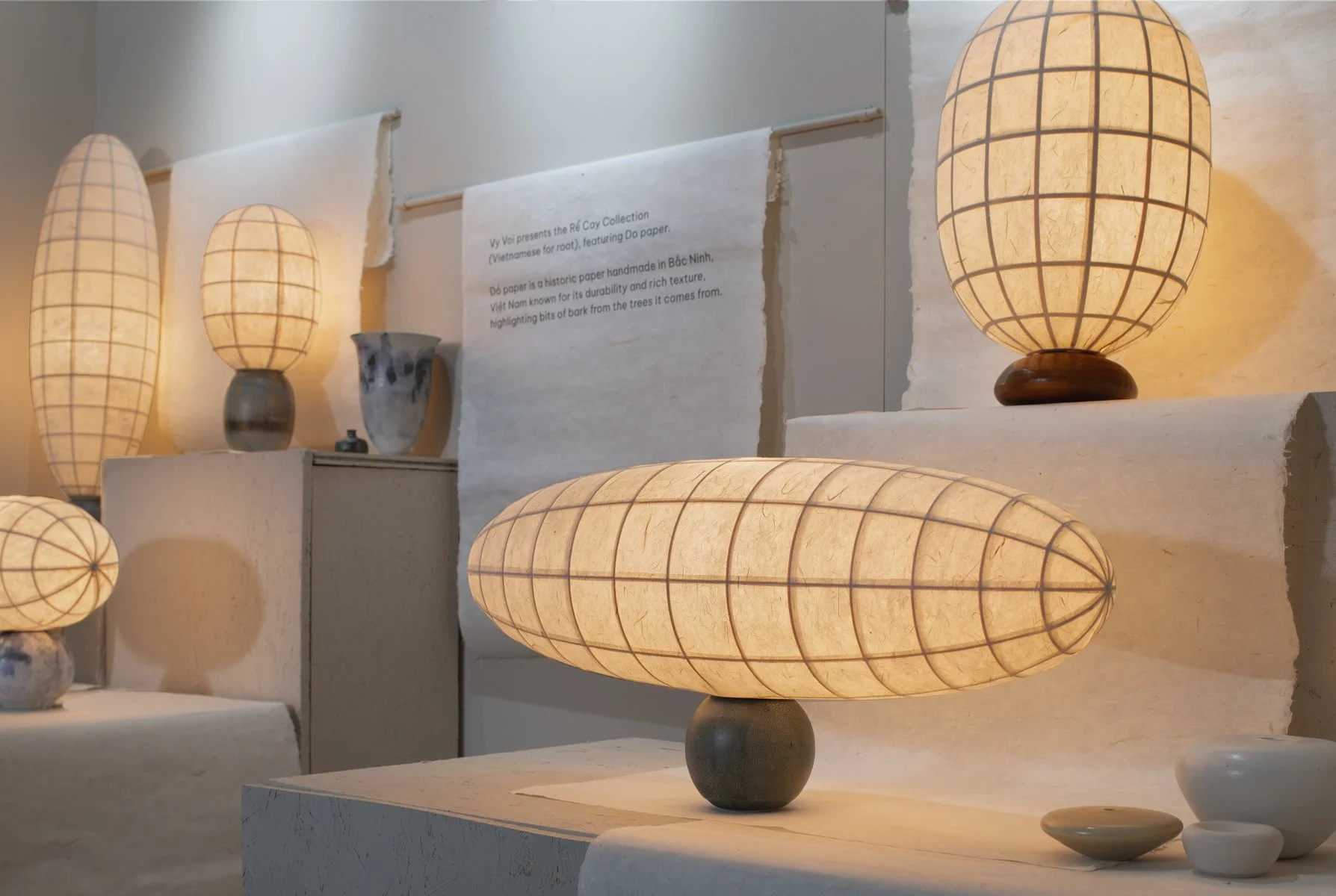 Vy Voi Studio Lamps. Custom made rice paper lamps in Vy Voi ICFF design showbooth
