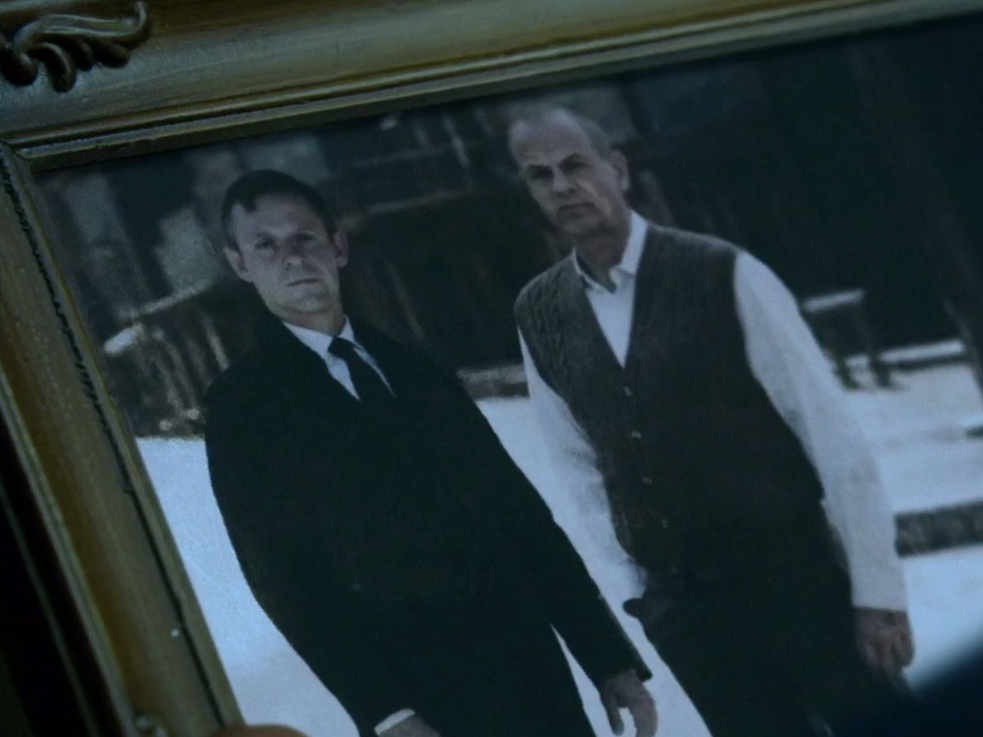 Young Ford and Father in the picture shown to Bernard.