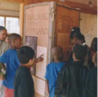 Children exploring exhibit panels