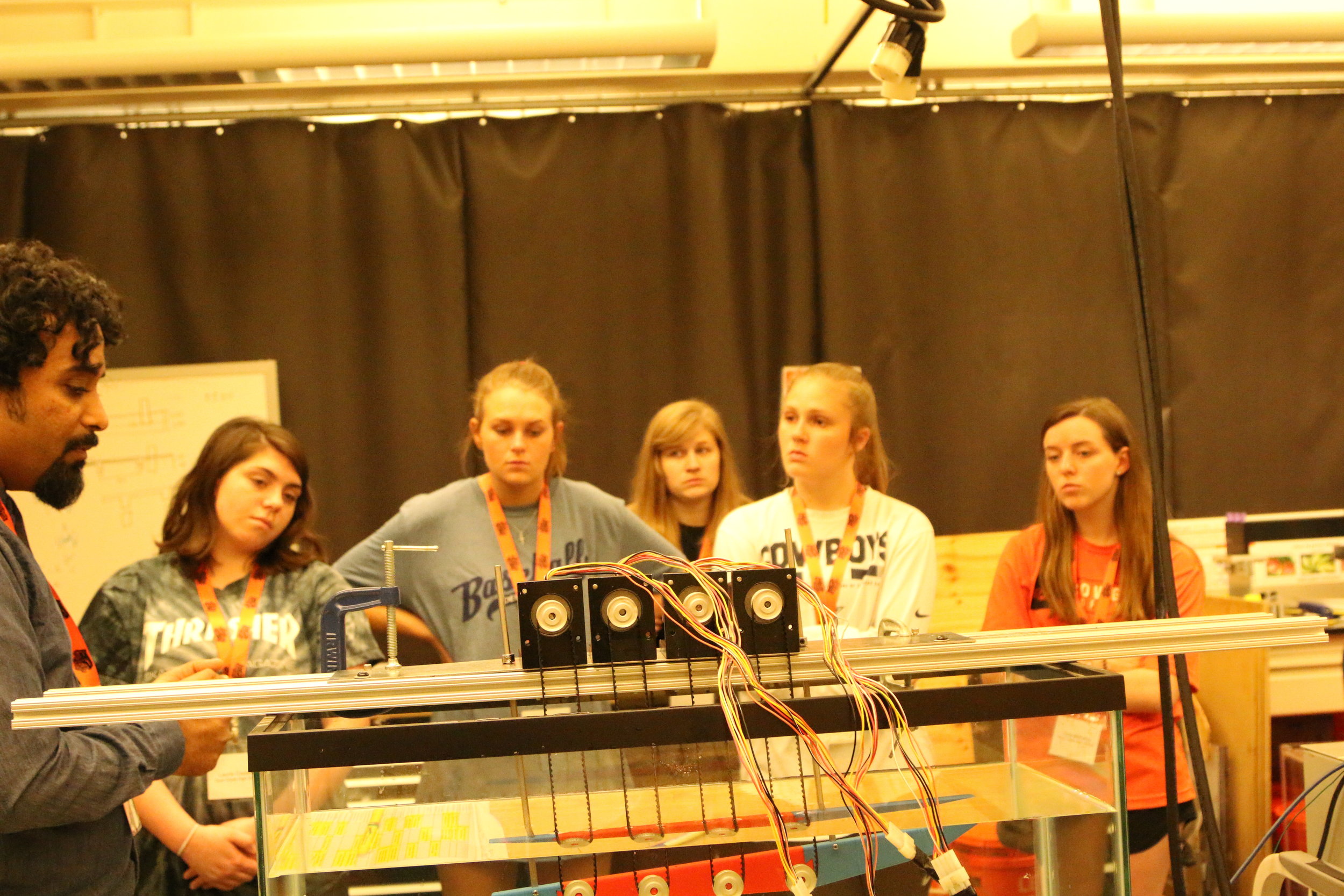  Students watching a demonstration of the “krillbot” 
