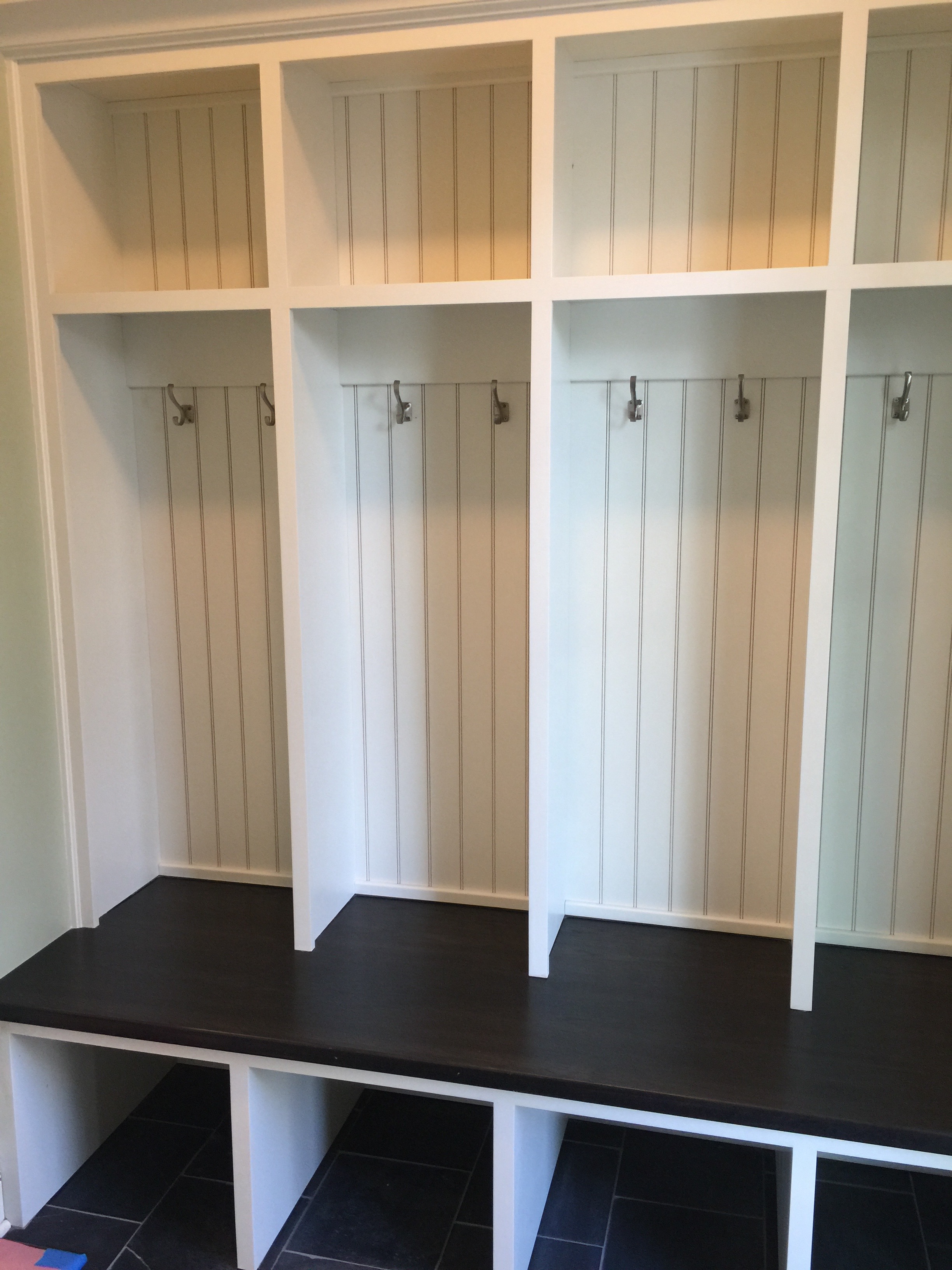 Your typical builder-grade, new construction mudroom.