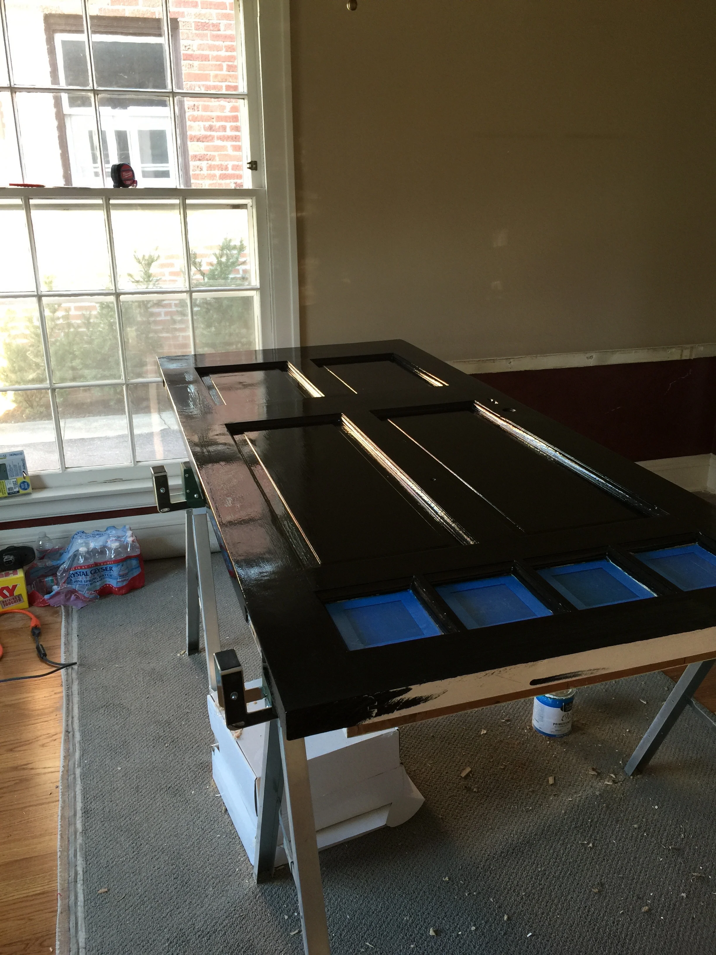 Although it's pricy compared to water-based paints, we like Dutch oil paint and primers when the job calls for it. The rich depth of color is incredible and nearly impossible to achieve with latex paints. This exterior door will endure decades after we're finished with it. 