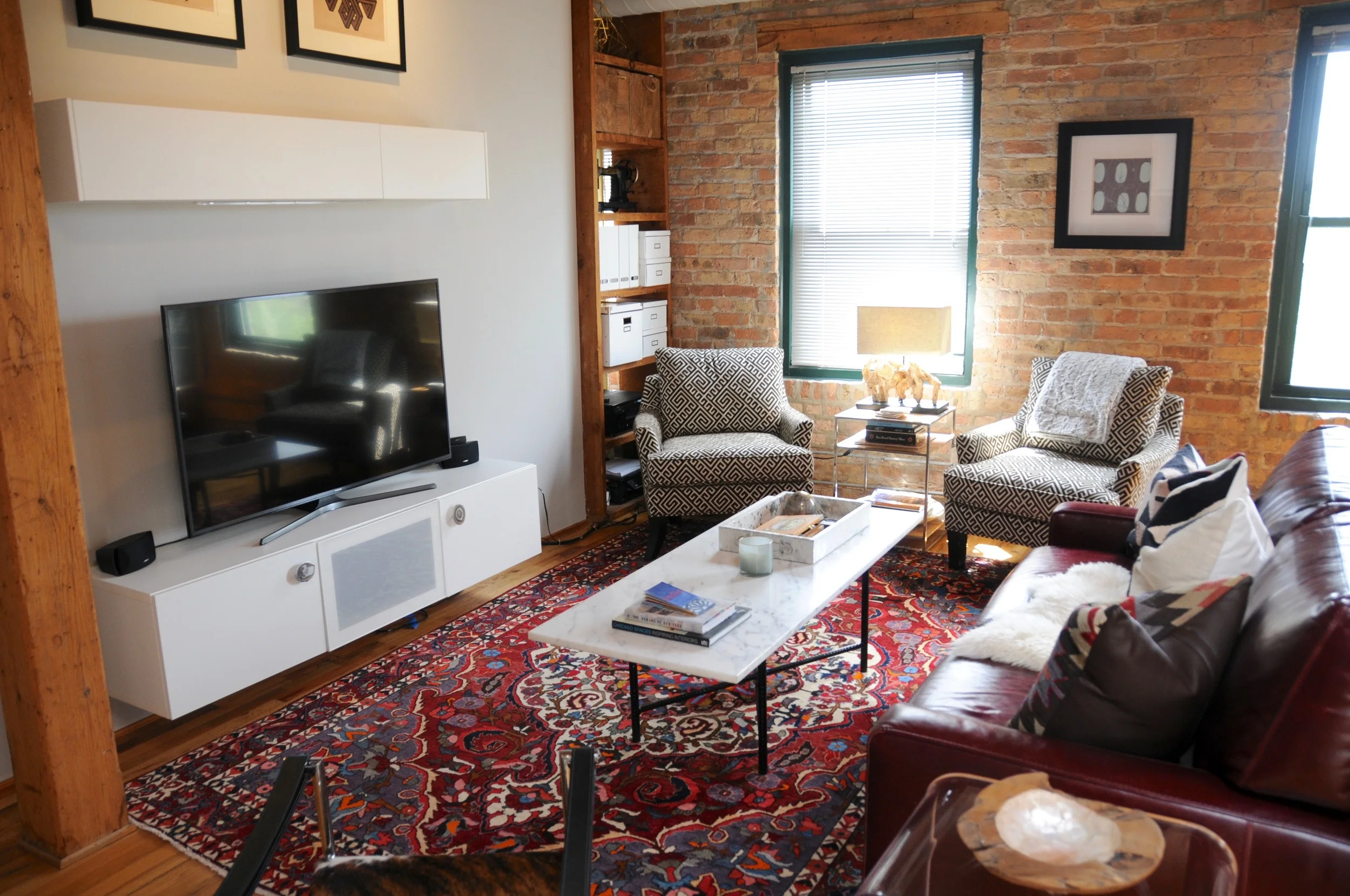 Modern and classic design elements can be found throughout the home, and the casual mix of materials, textures, and colors makes the space comfortably unstructured while maintaining the definition that many open spaces lack. 