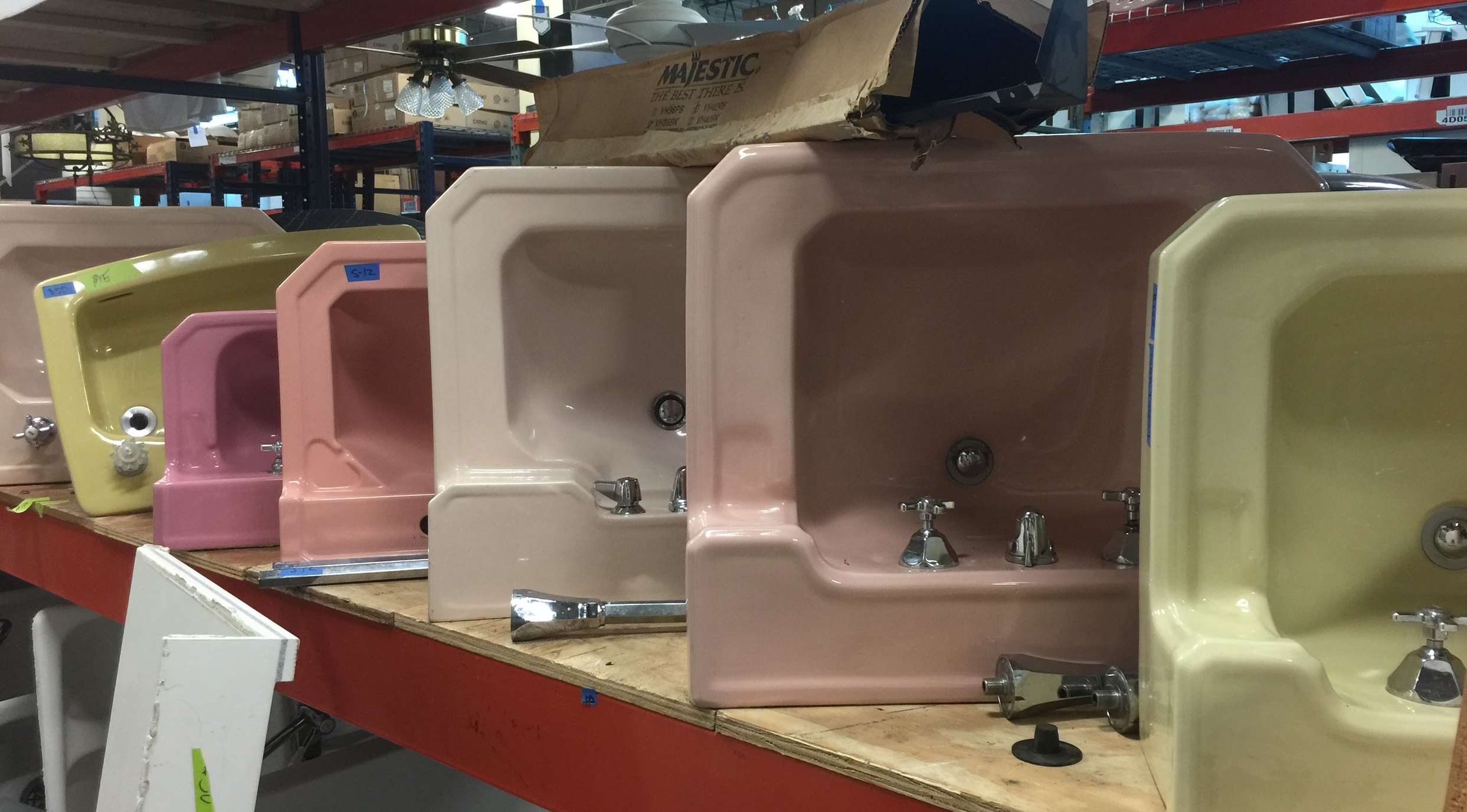Sink Series, artist unknown. Have I been working too hard or is there richly colored beauty in this gallery-like display of old porcelain sinks?
