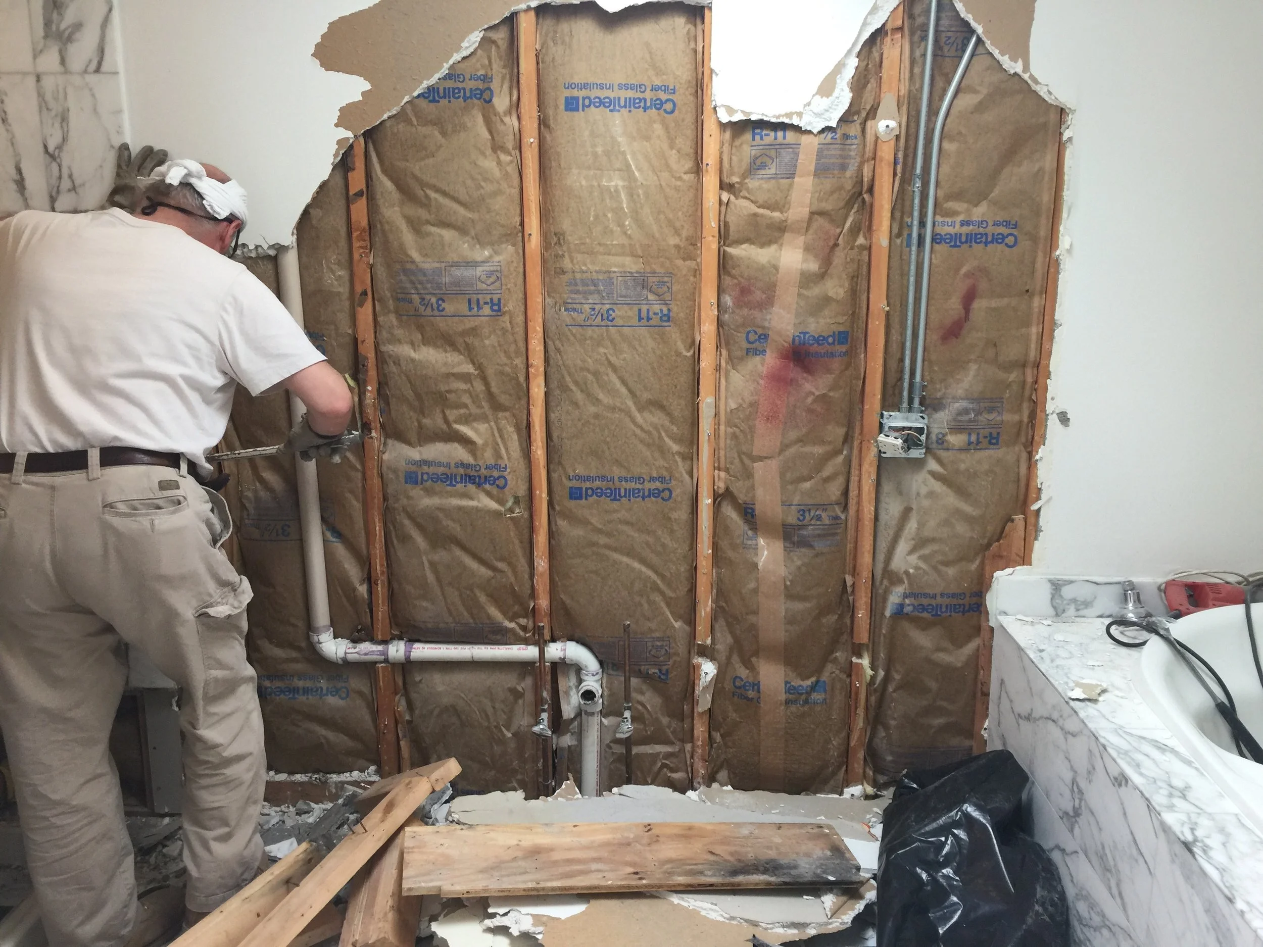 R-11 insulation on an exterior wall leads to very cold conditions in the bathroom. Proper insulation is a critical component of good renovation work, even though it is invisible when the project is complete.