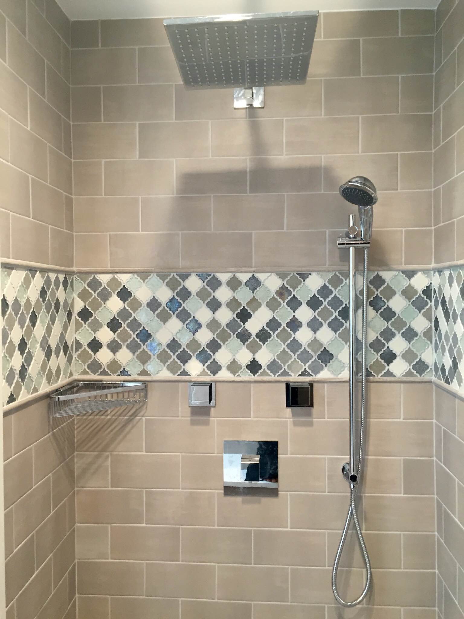 The client picked a mosaic tile accent to add visual interest to the the subway tile.