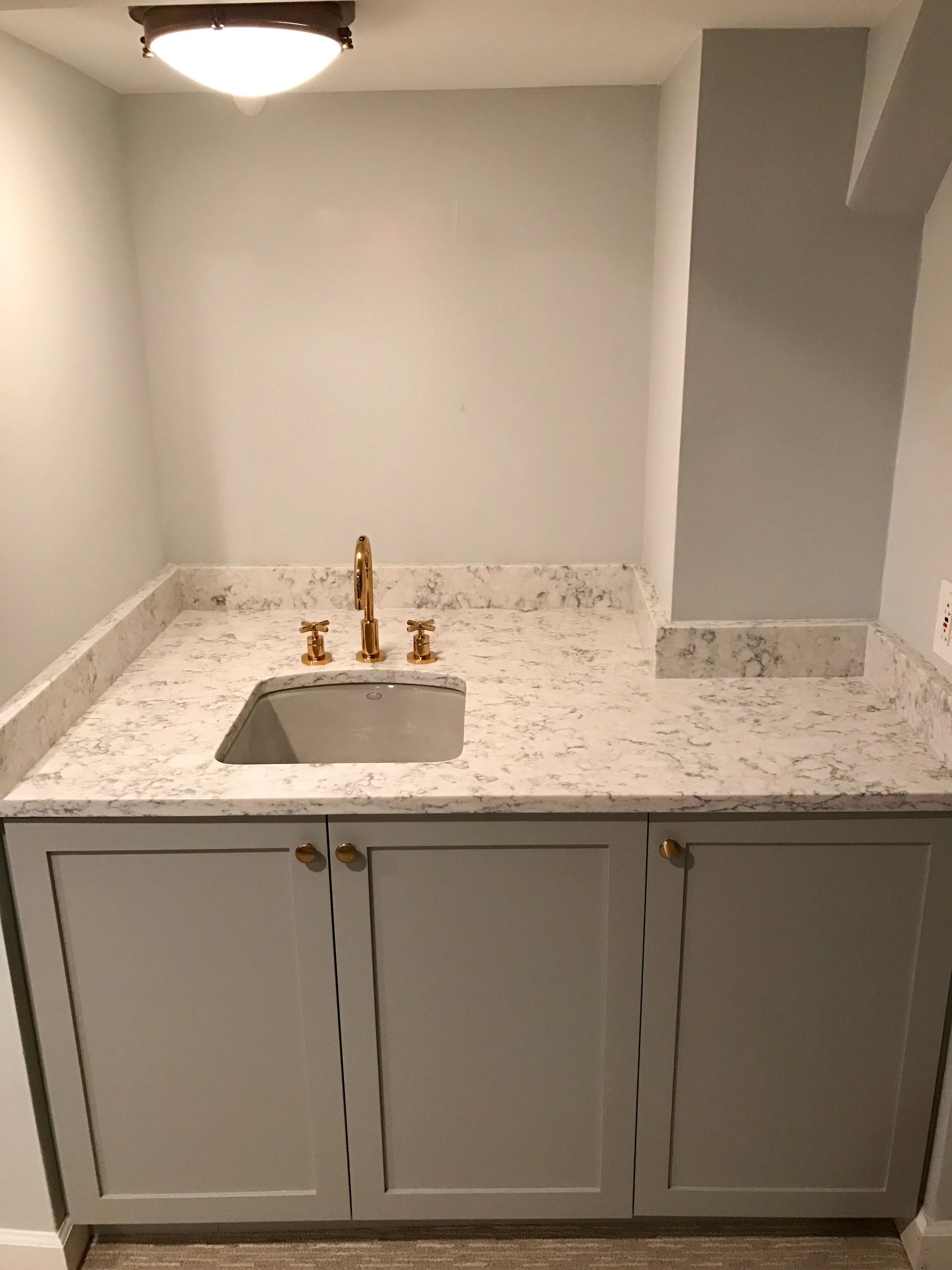 Wine cellar and wet bar, together at last. The ejector pit is concealed behind door number 3. That's a combination we can toast.