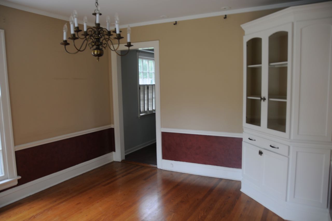 Before: the old wall separating the kitchen from the dining room.