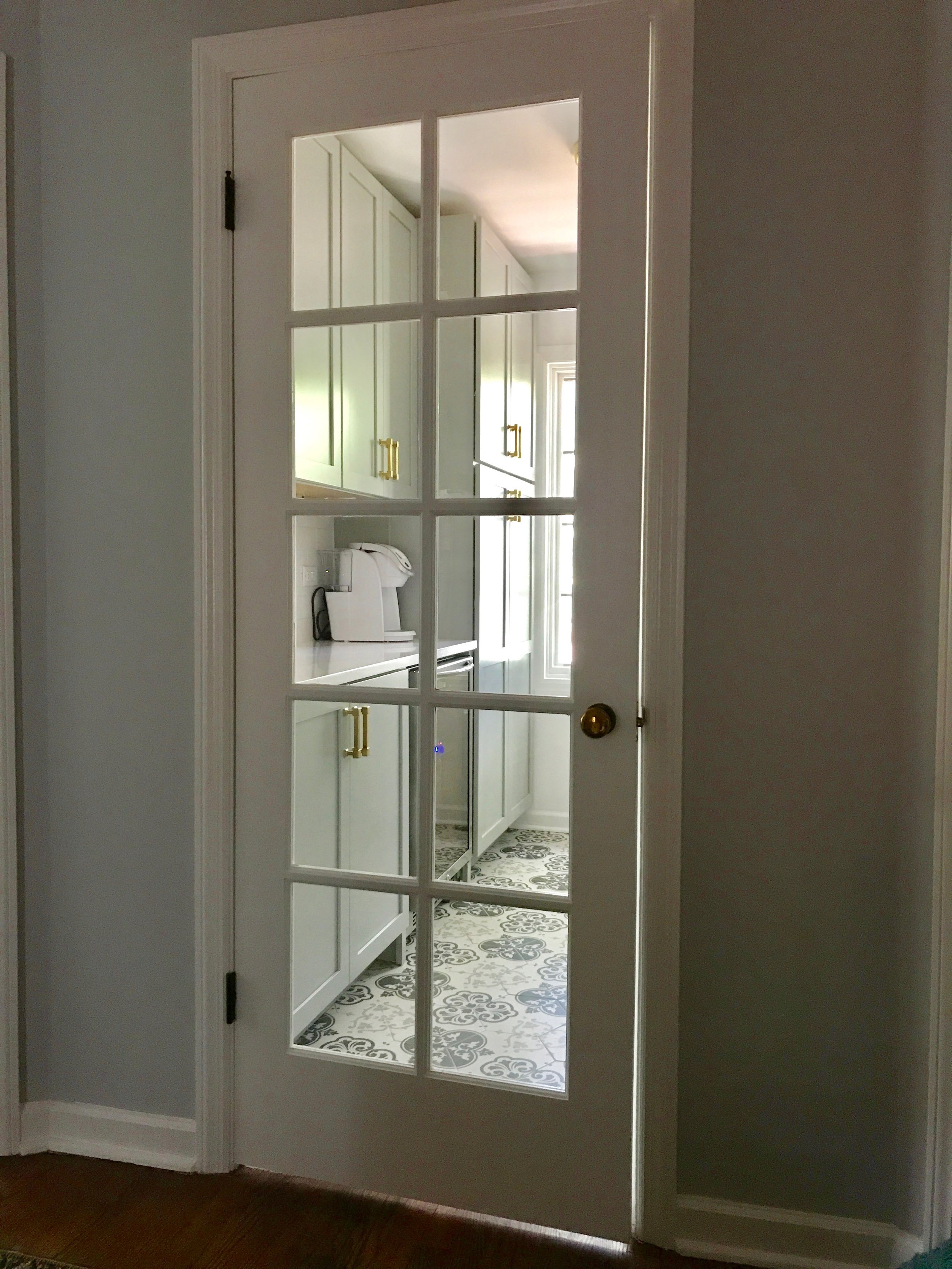 No longer a closed storage room, it was time to reclaim the natural light with a new 10-lite glass door.