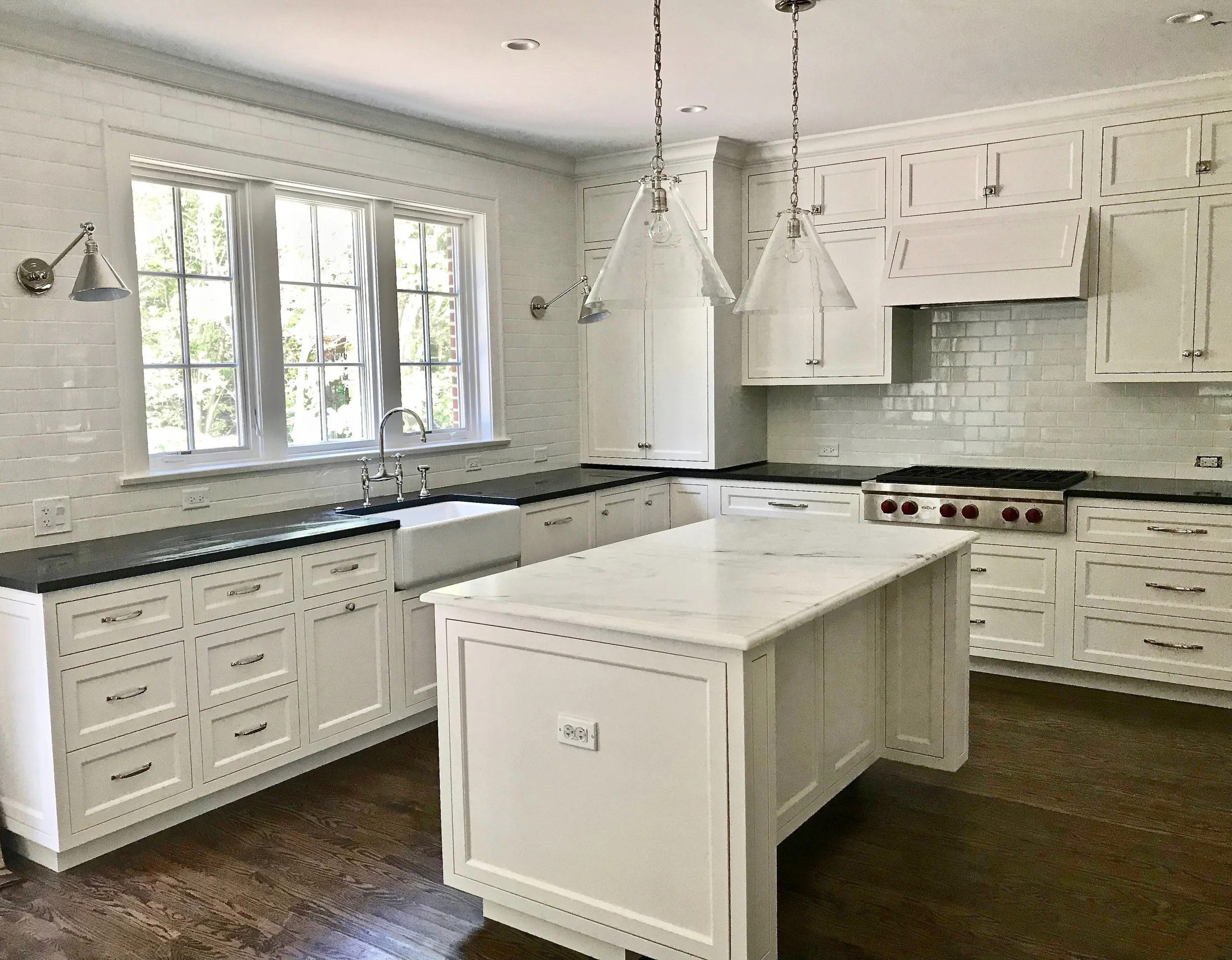 The new 22x14 kitchen with custom cabinetry and a honed Imperial Danby island top.