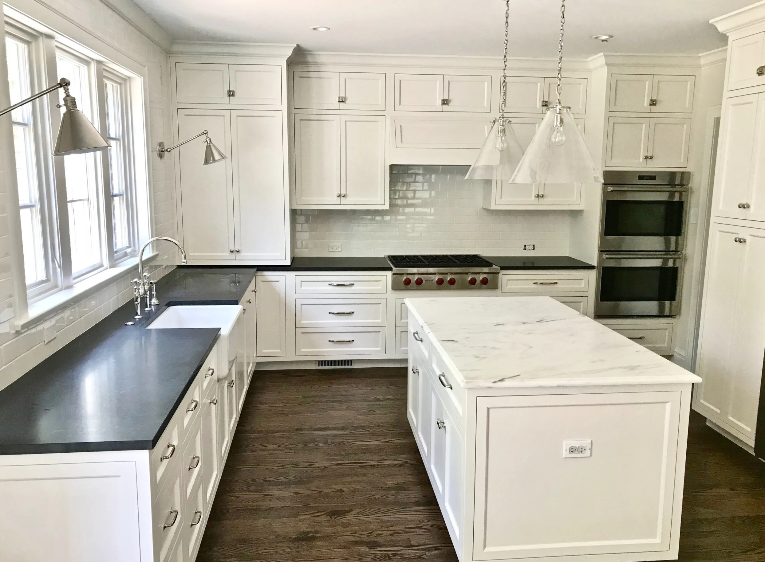 A large kitchen window provides ample natural light and a view of the back yard.