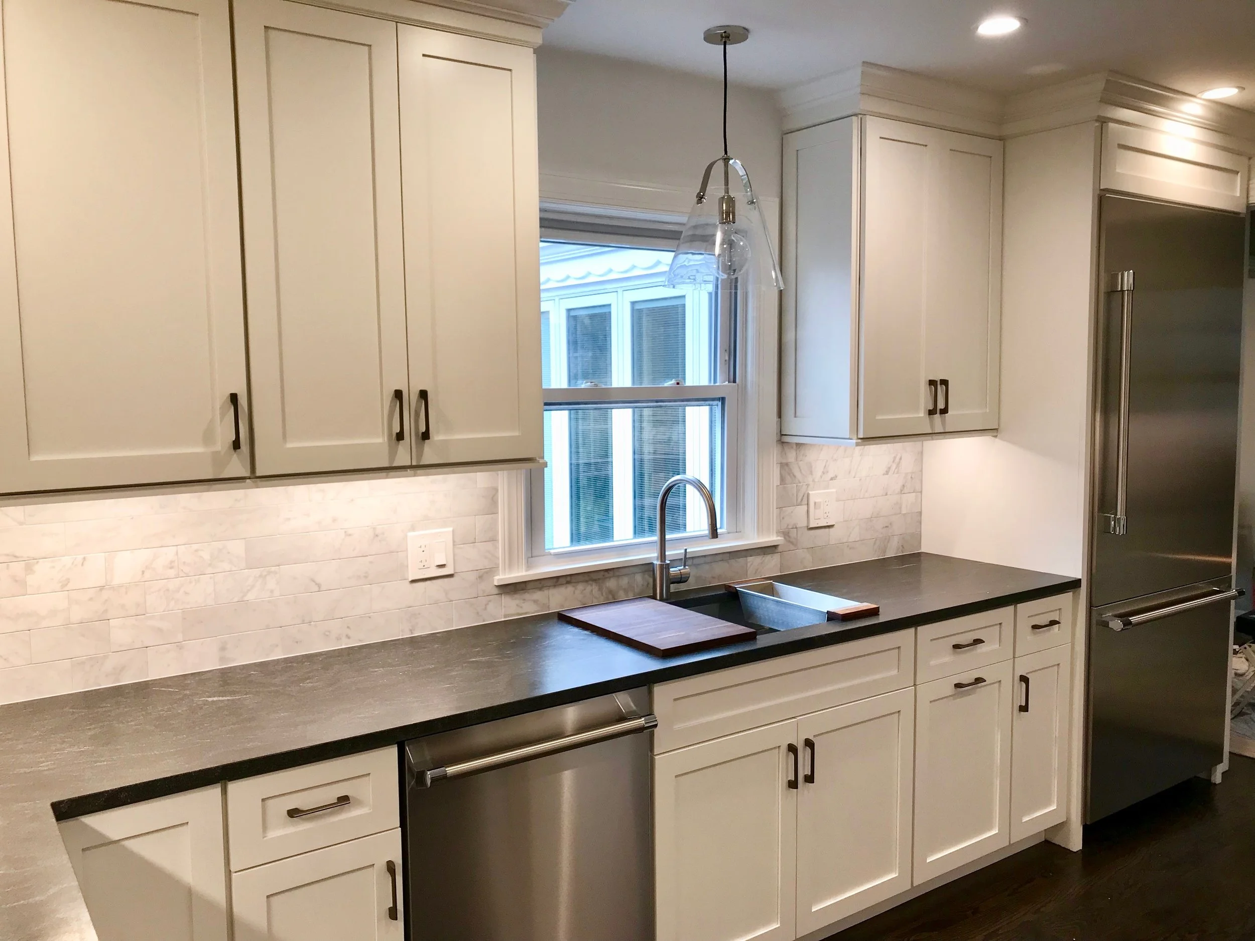 A counter-depth refrigerator is preferable despite the additional cost, especially in a small kitchen.