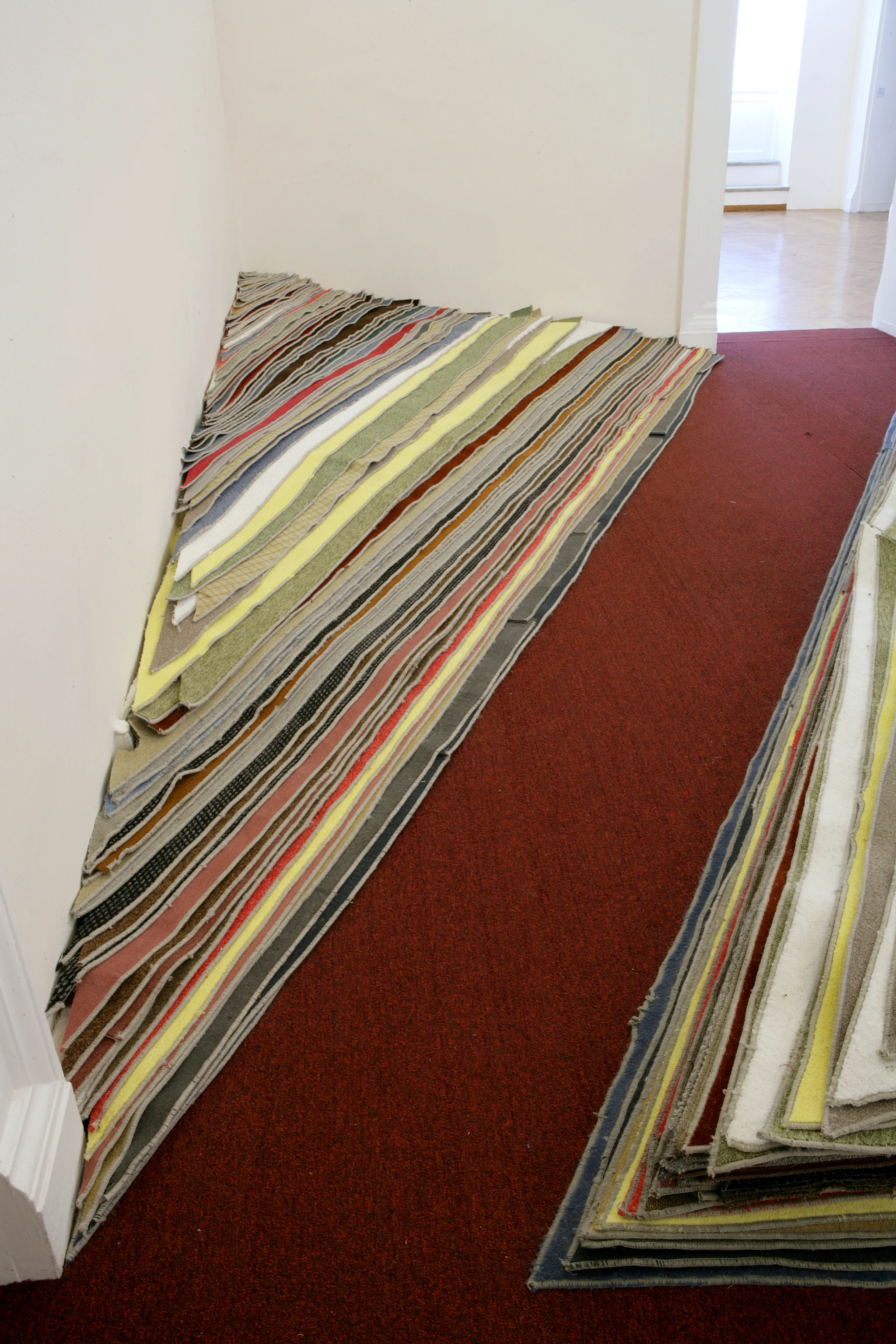    Uplift: The Mountain Palazzo delle Papesse    2008  Site specific installation  Carpet     ... produced especially for the exhibition .ZA-giovane arte dal Sudafrica, curated by Marlene Dumas, Kendall Geers, Berni Searle, Minette Vari, Sue Williams