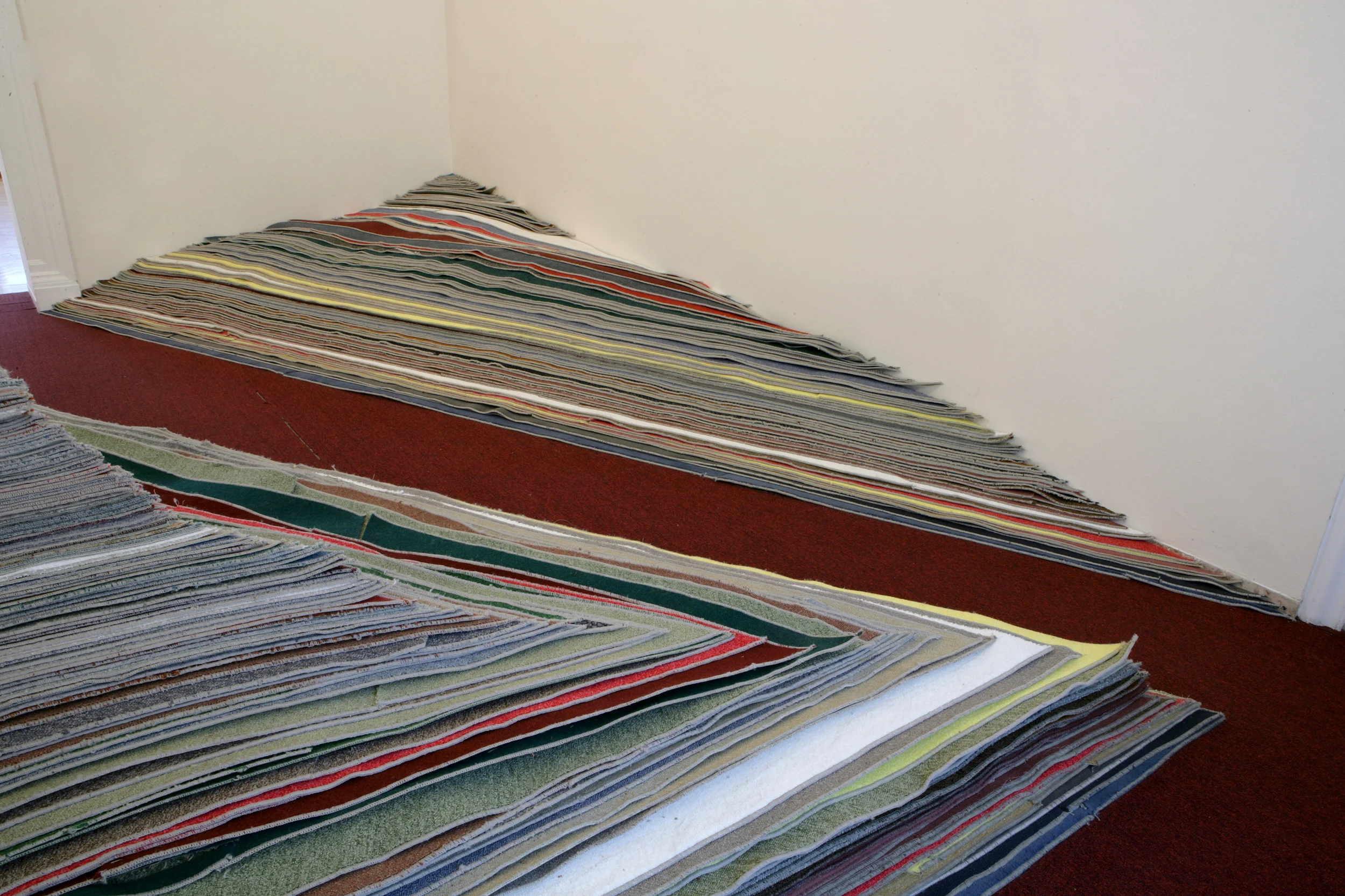    Uplift: The Mountain Palazzo delle Papesse    2008  Site specific installation  Carpet     ... produced especially for the exhibition .ZA-giovane arte dal Sudafrica, curated by Marlene Dumas, Kendall Geers, Berni Searle, Minette Vari, Sue Williams