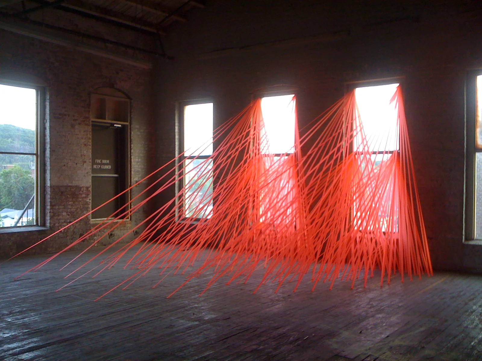 Tracing the Sun Site Specific Installation Hazard Tape 2010 Produced for the group exhibition Escape from New York , 2010, curated by Olympia Lambert