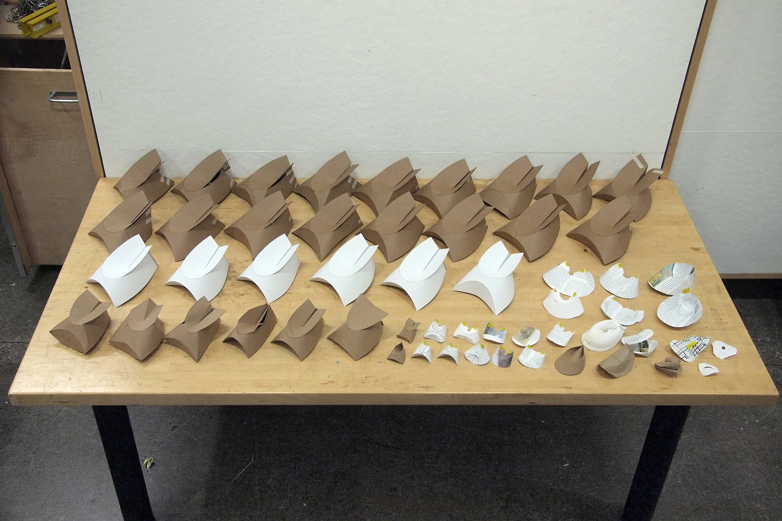In collaboration with Nancy Kim. Pandoragami is lightweight furniture design constructed out of a single sheet in order to offer qualities that we perceive furniture for a nomadic community should possess. It is lightweight, configurable, customizable and easily portable and storable. It was designed in response to the rapid advancements in mobile technology widens the work space spectrum, lessening the need for fixed and permanent office spaces. People are becoming nomadic workers. Nomadic workers can be defined as people who are found working ‘on-the-go or in transport: on buses, trains, airplanes and even sometimes in mid-stride via mobile devices. This trend is challenging the tradition work space and its furniture components. Furniture can be more configurable and lightweight.
