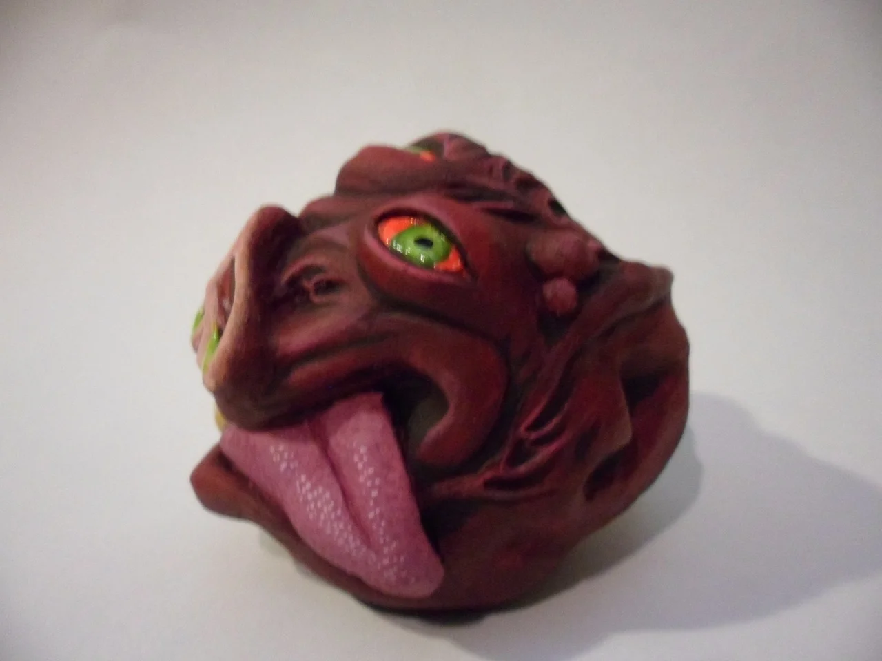 Custom creature "madball" made as a gift using Das paper clay, glue and acrylic paint.