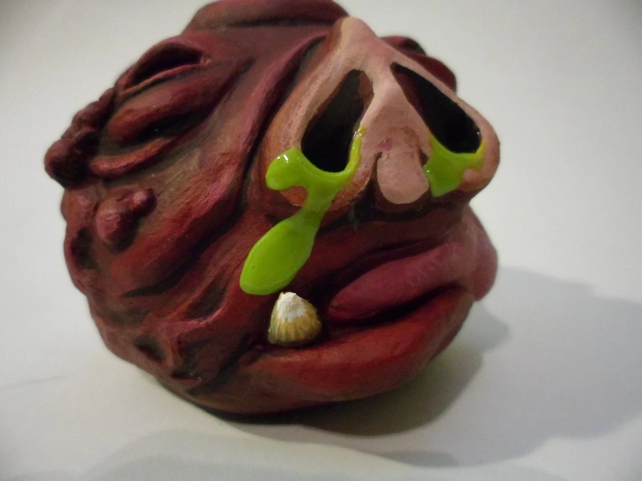 Custom creature "madball" made as a gift using Das paper clay, glue and acrylic paint.
