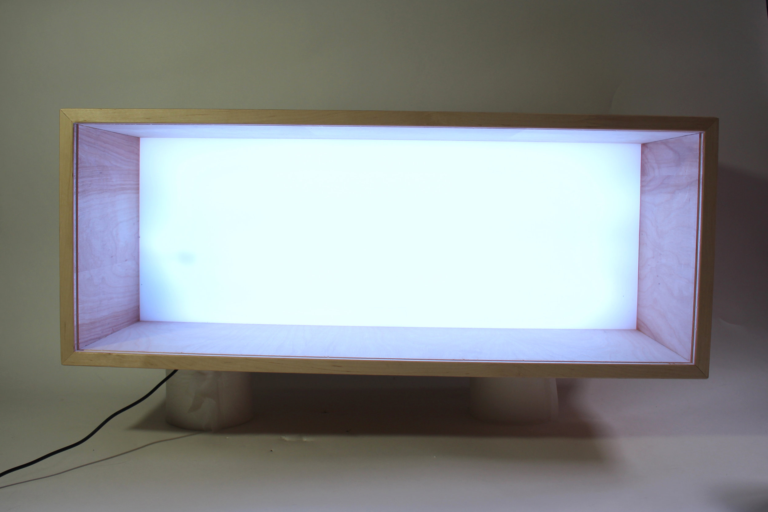 Then, based on the theme of the event we can fill the box with whatever "background" we choose, and choose an LED color to match. TBH, I think we could get a LOT more creative with these contents, but I just wanted to test out the concept with the random stuff in my house. Which at one point included one of my cats (very bad idea).