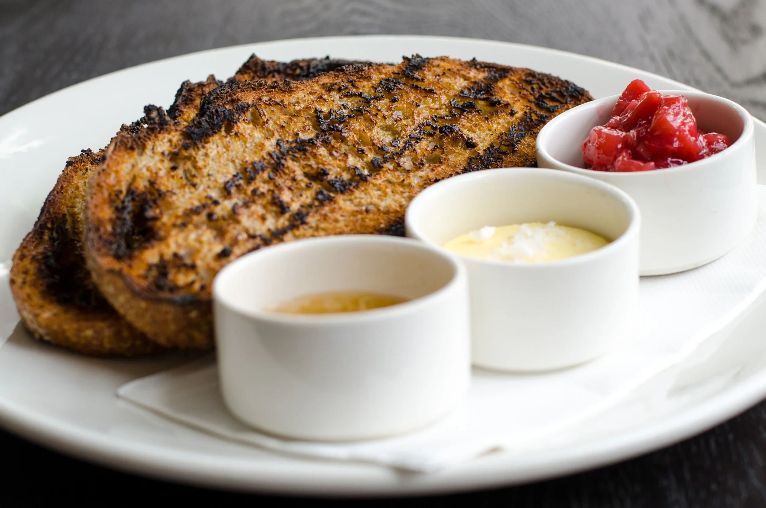 Sourdough toast served with house made jam, farmed honey, and cultured butter. Also from The White Rabbit.