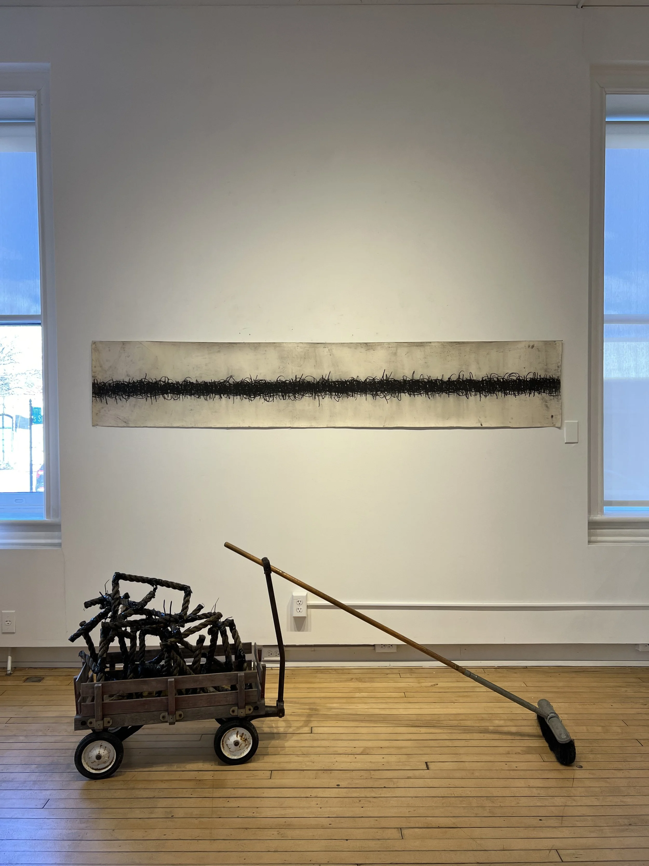 A "Torch" - Filled Wagon (with untitled charcoal writing)