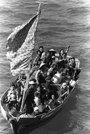 Indochinese refugees fleeing their homeland by boat during the Vietnam War. Thousands of them found safety in Australia after Frank Bauman convinced the government to overturn a ban on non-white immigration. 