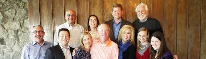 Dave Fiskum, pictured with many of his CFM colleagues, was roasted by friends and colleagues following his retirement. He had to be tricked into attending his own event by the promise of playing a round of golf with his buddies.