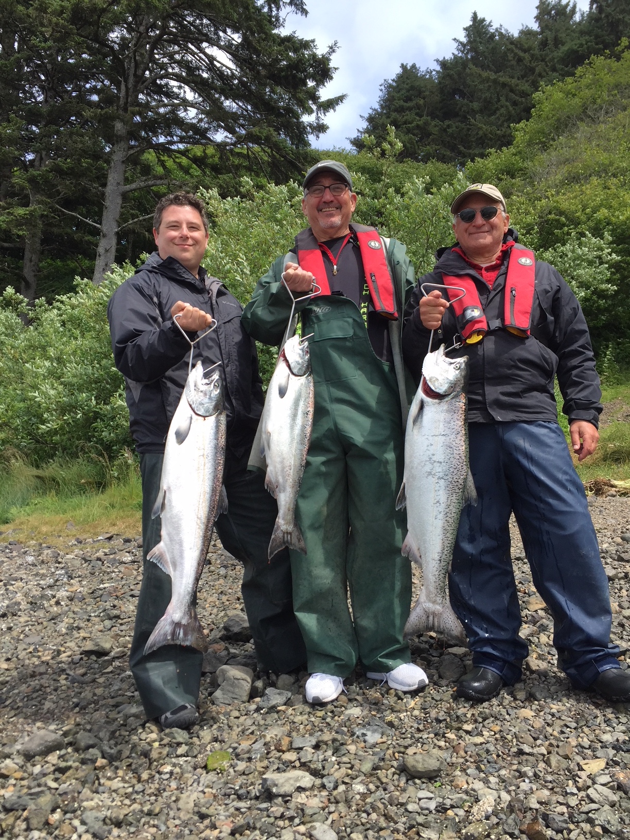 Dale Penn II, along with Tom Eiland and Norm Eder, showing off their prize catches