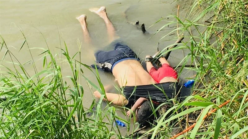 The picture of the drowned bodies of Salvadoran migrant Oscar Alberto Martínez Ramírez and his nearly 2-year-old daughter Valeria lie on the bank of the Rio Grande shocked the nation and accentuated calls for actions to address the humanitarian crisis on the border. (Photo Credit: Julia Le Duc/AP)