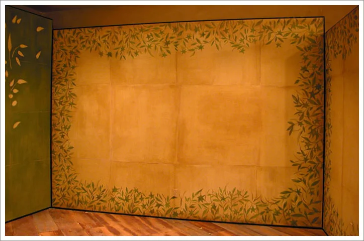 Vignette Walls: Left wall: Hand painted floral design on burlap. Right wall: Venetian Plaster. Anthropologie store. St Louis, Missouri.