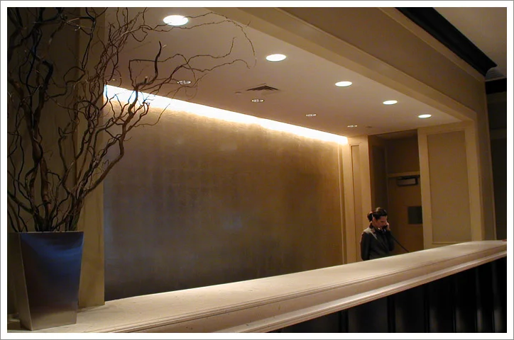 Gilded Wall: Aluminum leaf. Marriott Hotel downtown NYC. Designer: Alexandra Champalimaud.