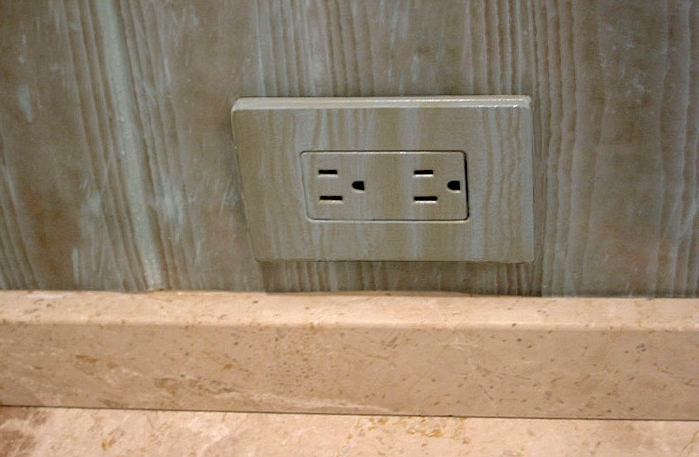   Faux wood outlet to blend existing wood on baseboard&nbsp;  