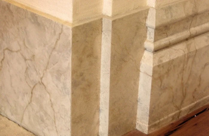Faux marble on baseboard.