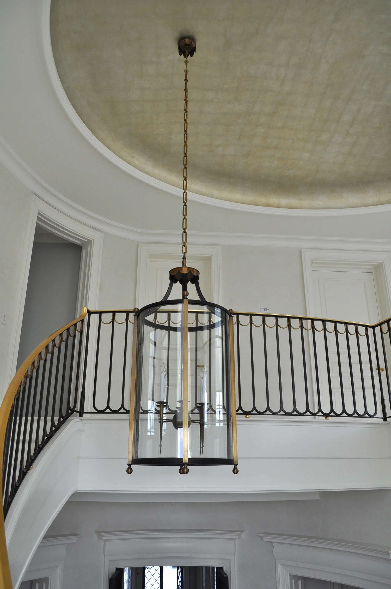 Aluminum leaf and antique glaze on cove ceiling–Interior Design by Robert A.M. Stern Interiors. Penthouse duplex—Toronto, Canada