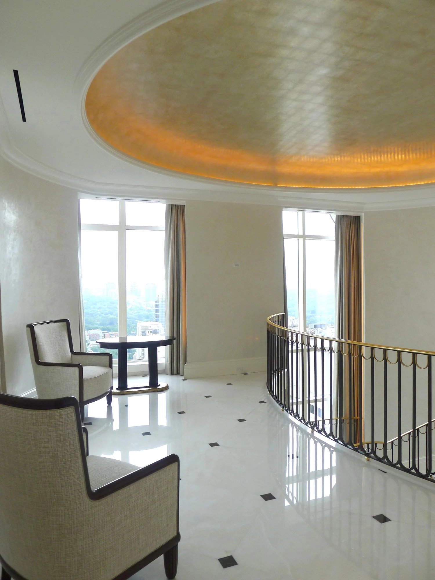 Aluminum leaf and antique glaze on cove ceiling–Interior Design by Robert A.M. Stern Interiors. Penthouse duplex—Toronto, Canada