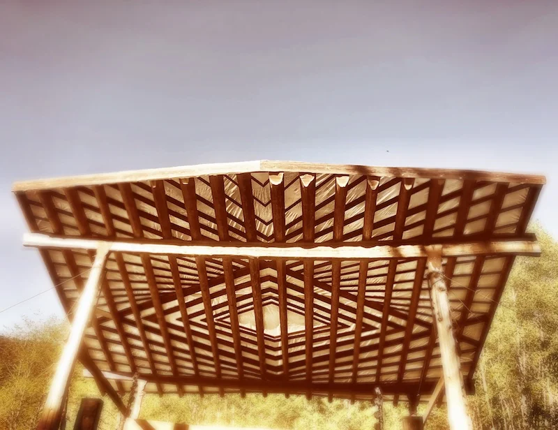 Cedar Stage 30’x 40’ fir and cedar corner posts and beams sourced from the land, beams torch blackened shou sugi ban style, structural butterfly fox brackets plasma cut from salvaged steel, Alpine Schist stone garden and steps