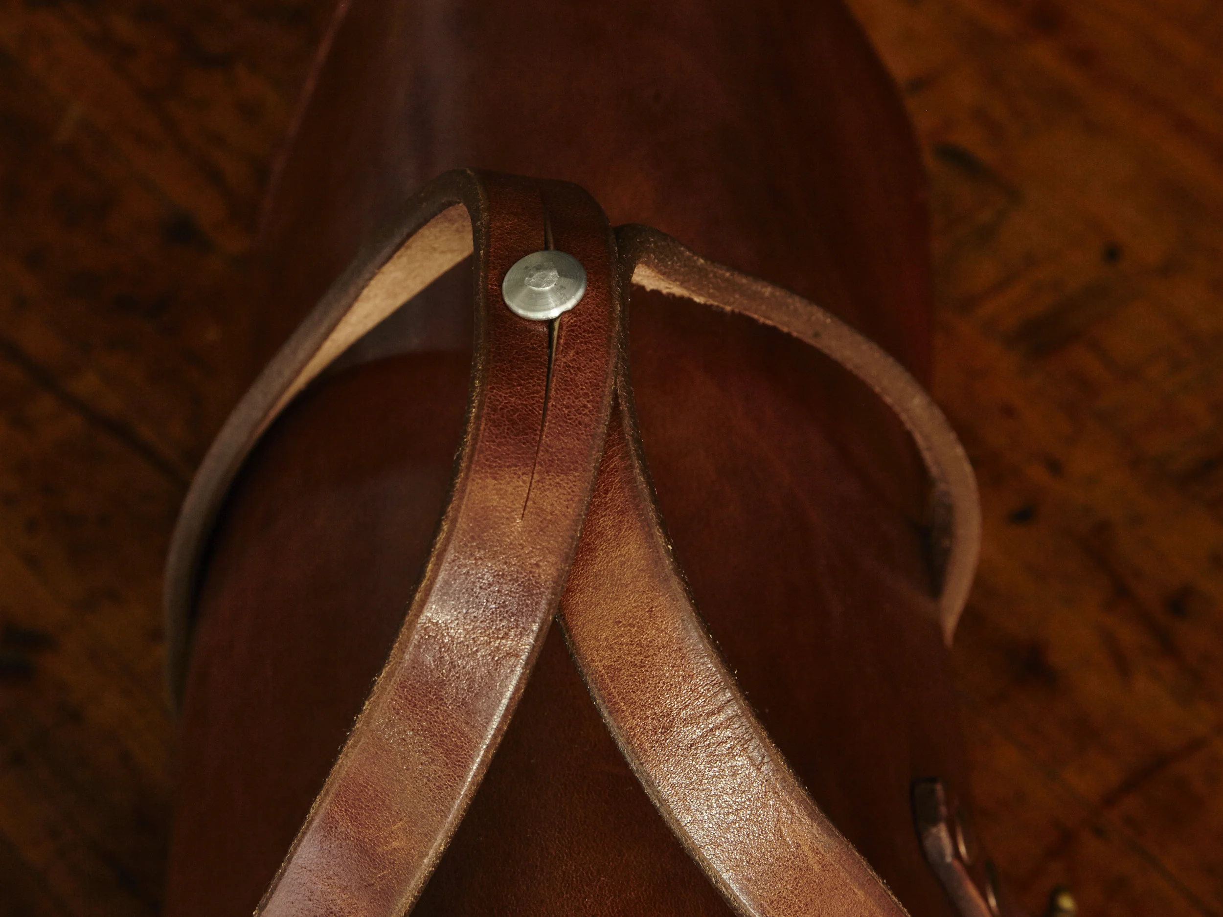 We've custom machined the holder studs on our tool bags from high grade aluminum with a solid through rivet in a softer alloy allowing it to be securely hammered in place. 