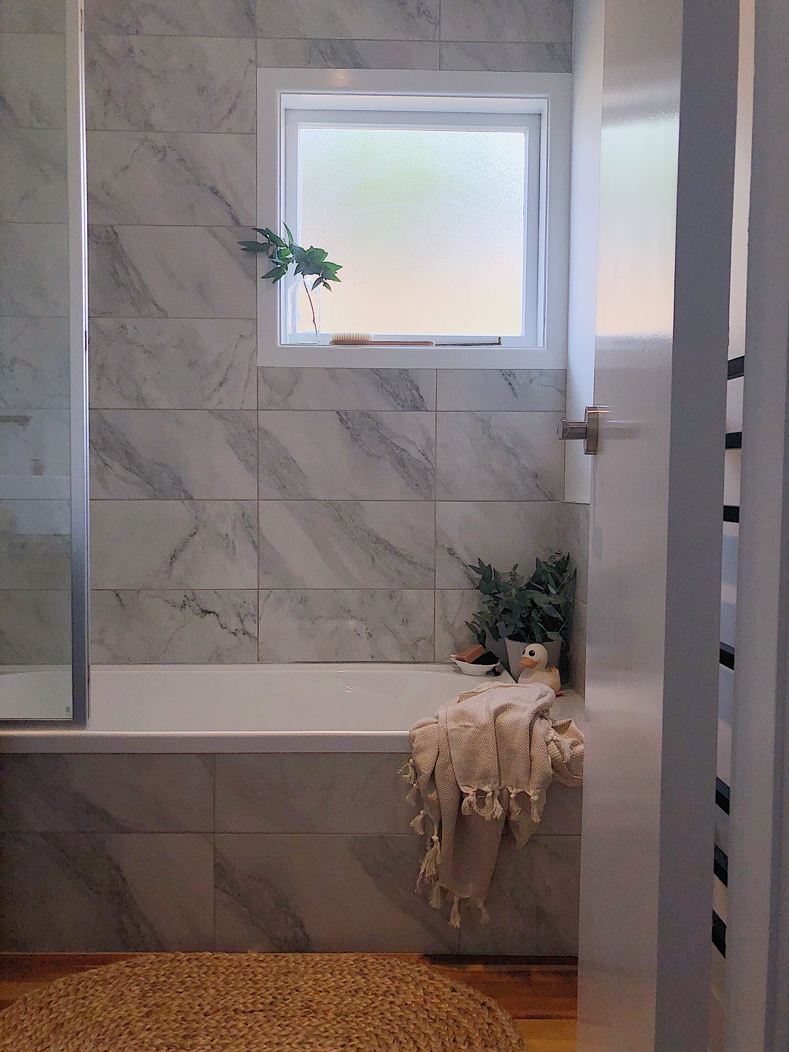 Pearson and Projects Relocatable Reno Bathroom Project Marble Tile Bath Screen .jpg